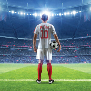 Football,Player,With,Ball,In,The,Stadium,,3d,Rendering