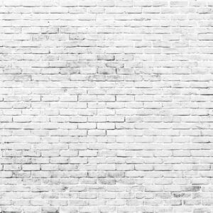 White and grey brick wall texture background with space for text